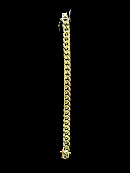 Pulsera de eslabones cubanos chapada en oro amarillo de 14 quilates. Grosor: 10 mm. Largo: 7,5 pulgadas.